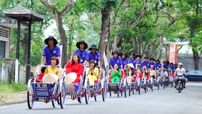 Cyclo tour – a leisurely sightseeing experience in Hue