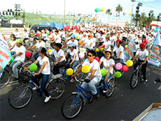 Floral bicycle parade to encourage marine environment protection